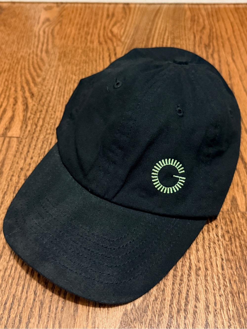 Black Baseball Cap with Lime Green logo of Greenpoint Film Festival